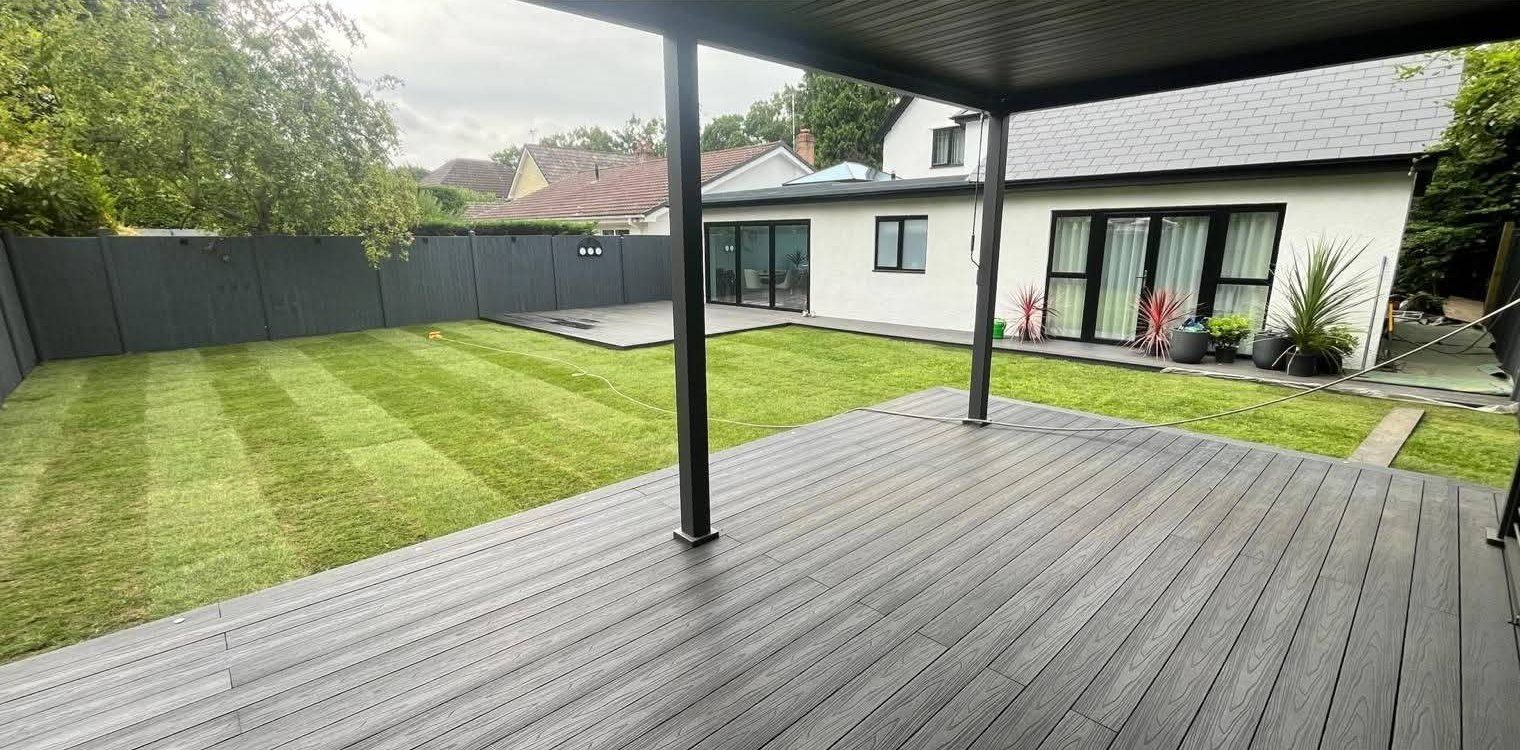 After: cleared and levelled garden finished with a new striped lawn
